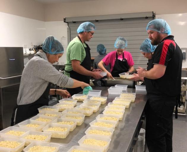 Selwyn Bellyful volunteers making meals as part of the 'cookathon' at the Lincoln Event Centre.