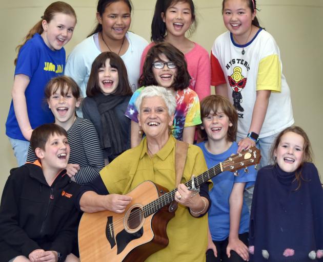 Natalie Yeoman sings one of the songs from her new CD with George Street Normal School pupils. Photo: Peter McIntosh
