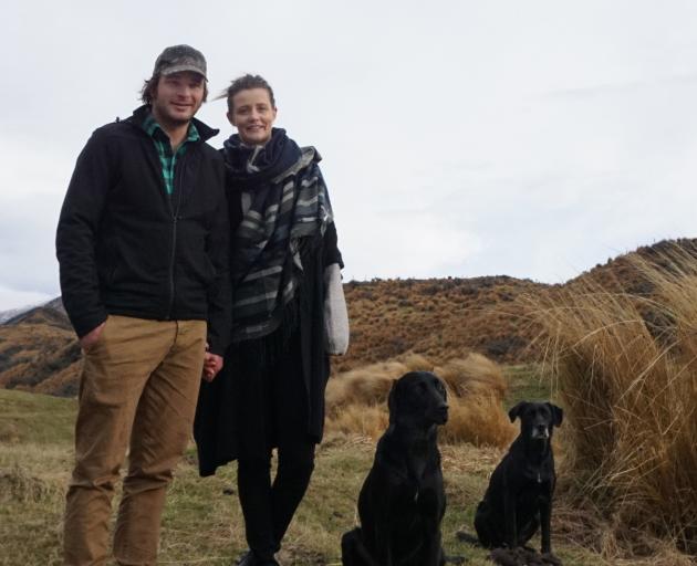 Gathered Game founders Chris and Sally Thorn, of Te Anau, with their dogs Sika (left) and Milla....