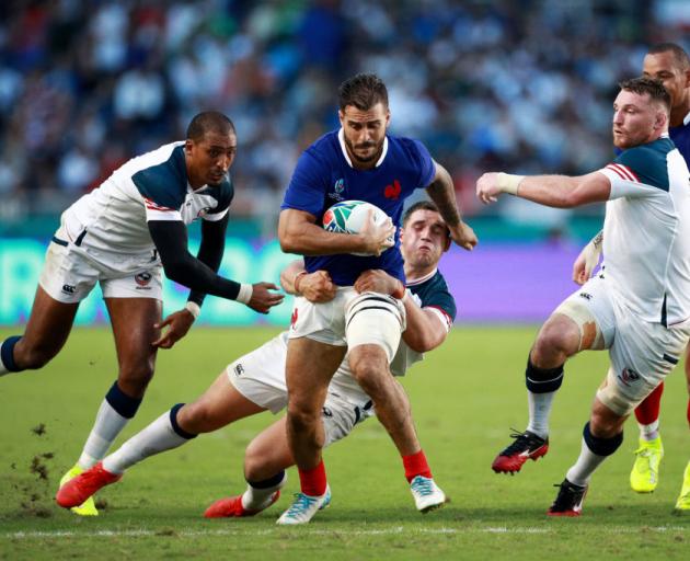 Sofiane Guitoune of France is tackled during the Rugby World Cup 2019 Group C game between France and USA. Photo: Getty Images