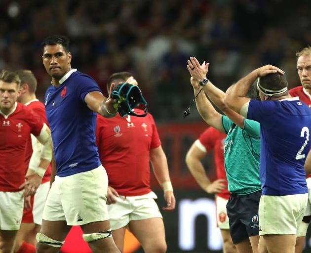 Sebastien Vahaamahina apologises to his France team mates after being red carded in Sunday's...