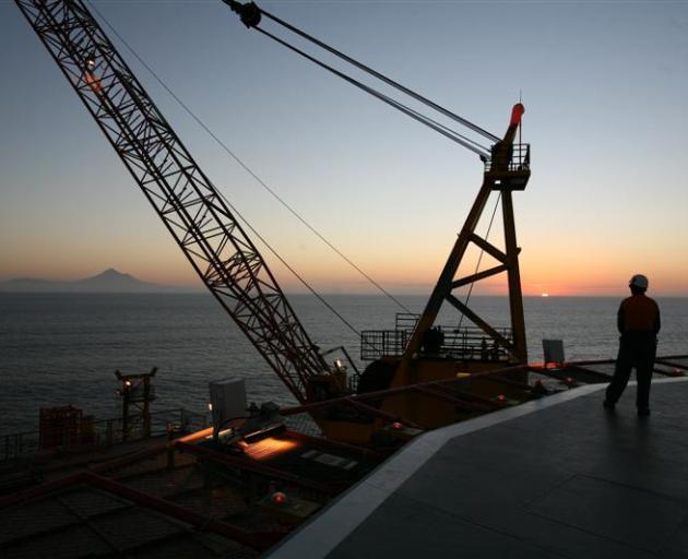 The hardware of the Taranaki oil and gas industry, offshore rigs and onshore processing stations.