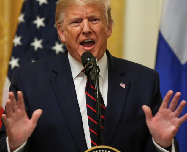 US President Donald Trump speaks at a conference at the White House this week. Photo: Reuters 