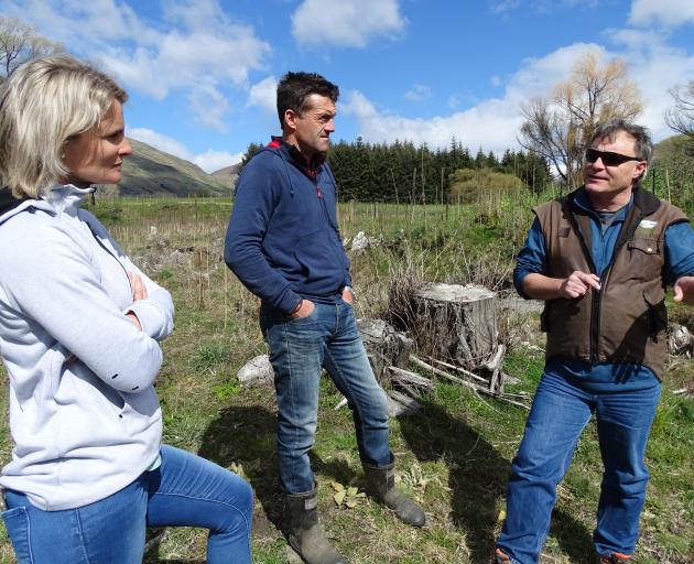 Allannah and Duncan McRae talk through future plans with Chris Arbuckle at their Fish Pond wetland.  PHOTO: KERRIE WATERWORTH
