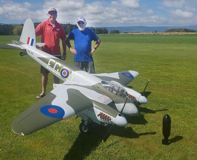 The Mosquito model aircraft will be flown at Wanaka by Frazer Briggs with his father Mike (right)...