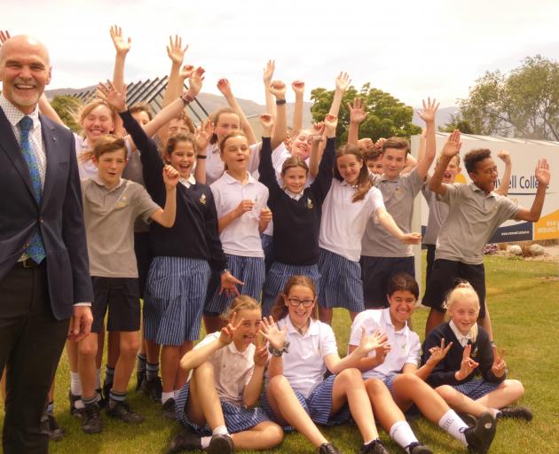 Cromwell College principal Mason Stretch (left) stands alongside a flock of year 7 pupils. Photo: Adam Burns