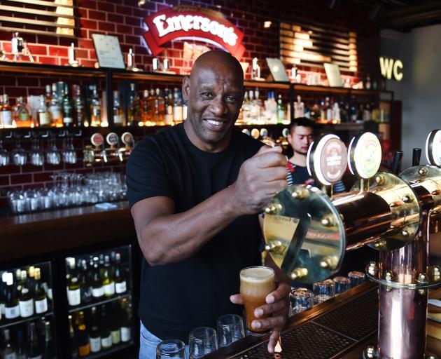 Having a crack at pouring a pint at Emersons in Dunedin yesterday is Shaun Wallace, of the...