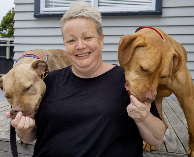 Jen and her dogs Sapphire (left) and Stark.   PHOTO: GEOFF SLOAN