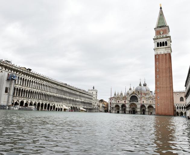 A general view of the flooded St. Mark's Square, as high tide reaches peak, in Venice, Italy. Photo: Reuters