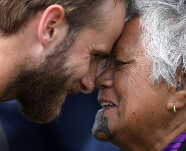 England captain Joe Root (left) and New Zealand captain Kane Williamson take part in a hongi during a Maori welcome ceremony at Bay Oval in Mount Maunganui yesterday. Photo: Getty Images