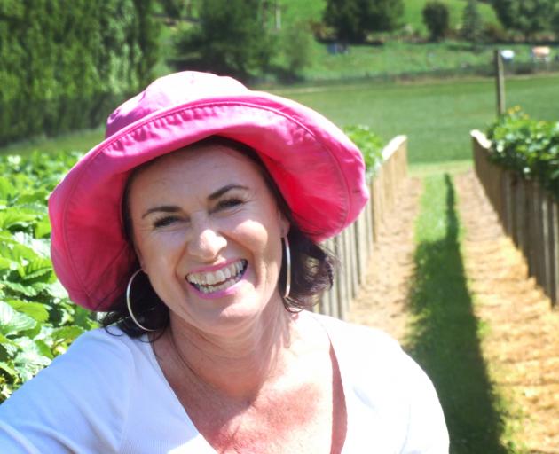 Leanne Matsinger, of Matsingers Berry Farm, in her recently developed hydroponic strawberry patch...