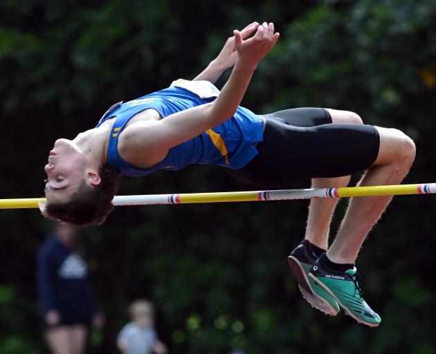 Tokomairiro High School pupil Millar McElrea competes in the high jump at the Caledonian Ground last Saturday. Photo: Gerard O'Brien