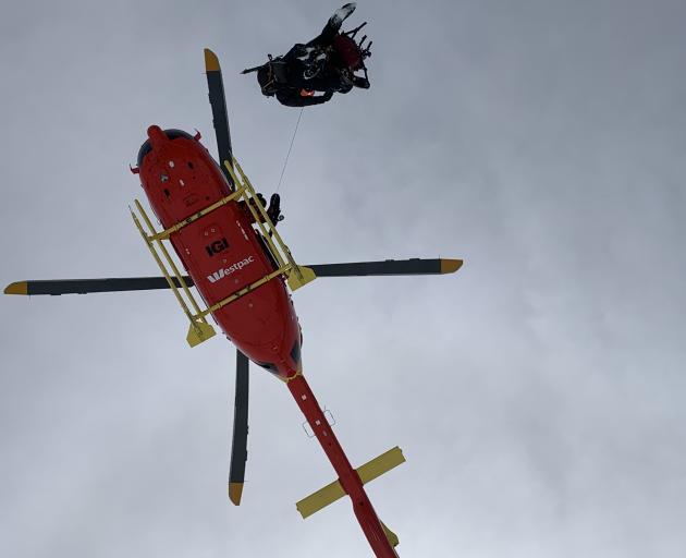 Westpac Rescue Helicopter begins the rescue of a woman who fell 600m down Mt Rolleston. 