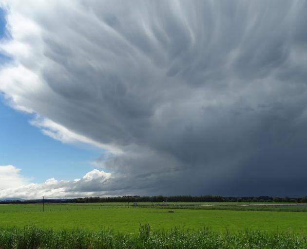 Dark clouds roll across inland North Otago yesterday. Photos: Daniel Birchfield