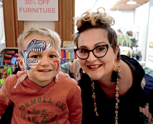 Oli Robins (4) had his face painted by Luzette Crossan at Design Federation on the launch night...