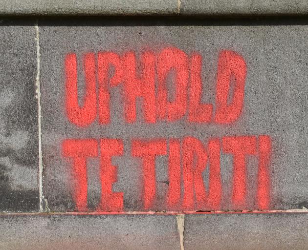‘‘Uphold Te Tiriti [the Treaty]’’ was painted on the statue.