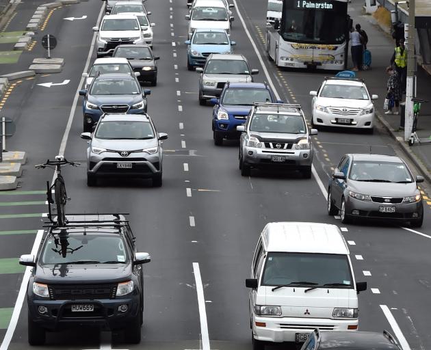 Cars clog both northbound lanes on Cumberland St in Dunedin yesterday afternoon. Inset: A similar pole-mounted sensor used in Hamilton. Photo: Peter McIntosh