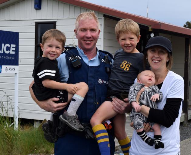 Constable Allan Lynch, his wife Kirsty and sons (from left) Ollie, Richie and Fergus outside Middlemarch police station last week. PHOTO: SHAWN MCAVINUE