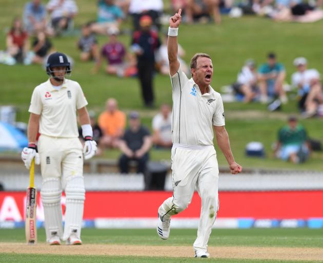 Neil Wagner celebrates picking up the wicket of debutant Zak Crawley late on day 3 in Hamilton....