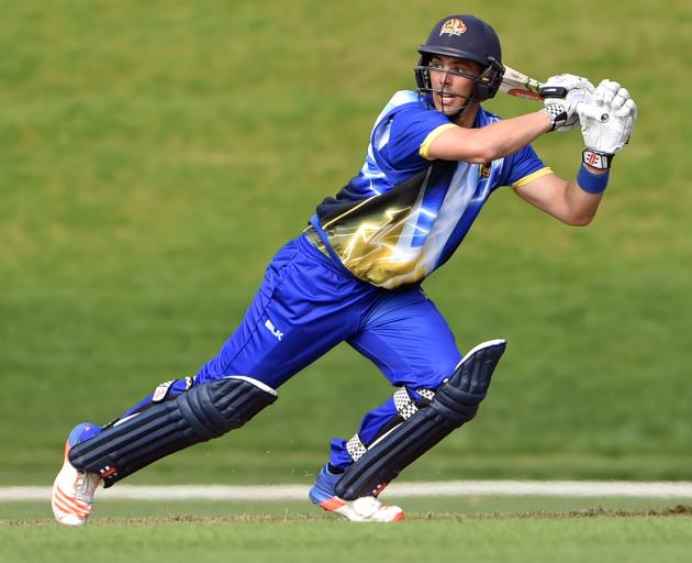 Otago batsman Anaru Kitchen flays another delivery during his innings of 143 not out in the Volts...