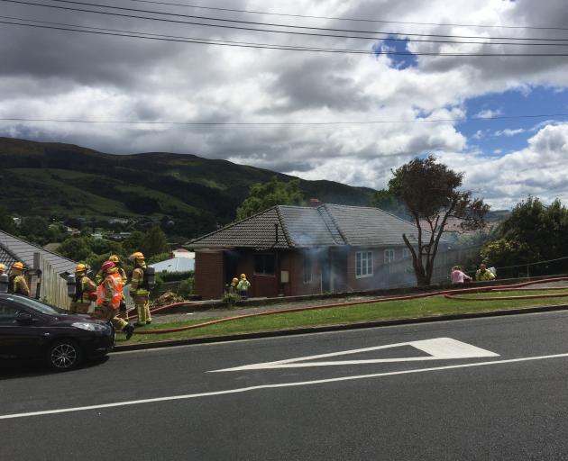 A house on Mayfield Ave has been significantly damaged by fire. Photo: Gregor Richardson