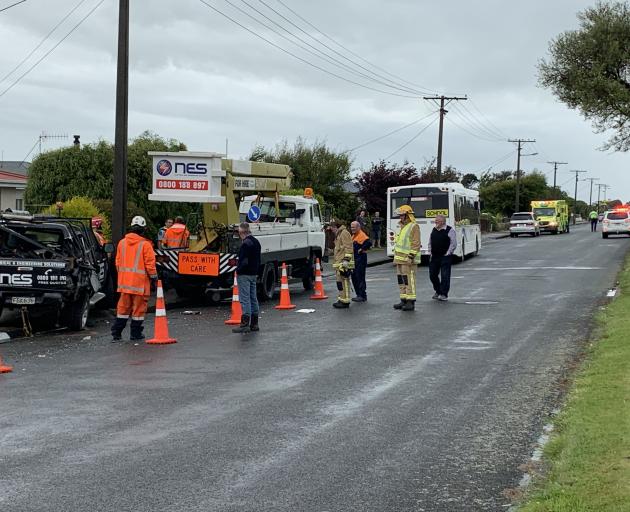 Emergency services at the scene of a crash in Invercargill after a bus hit a parked vehicle. Photo Abbey Palmer
