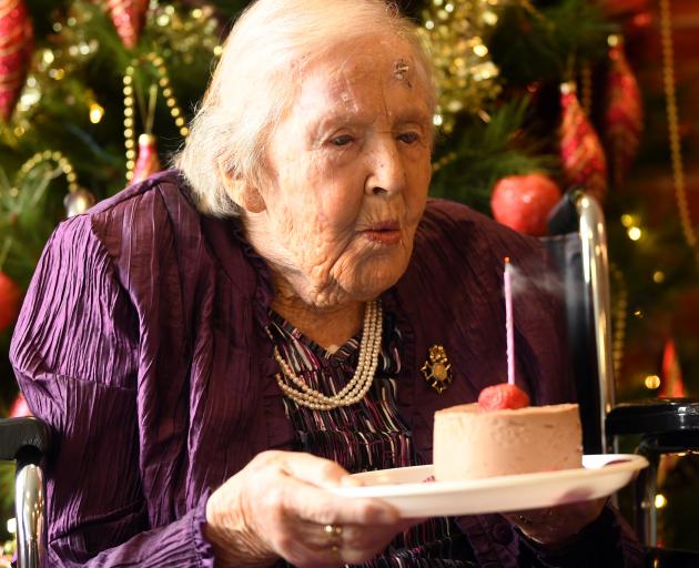 Dawn Ibbotson marks her 105th birthday with cake and a candle. PHOTOS: STEPHEN JAQUIERY