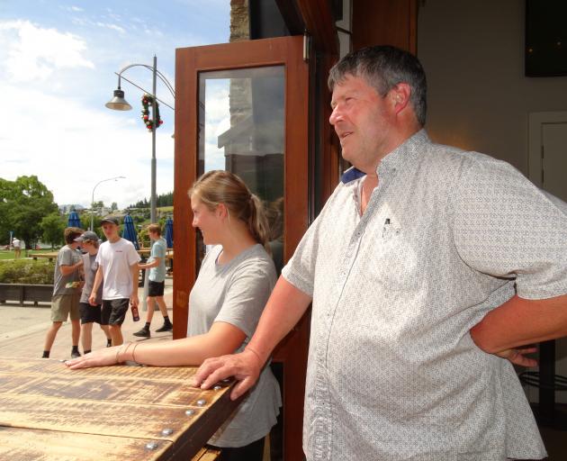 Lake Bar owner Peter Byrne and restaurant manager Erin Officer get ready to greet their first...