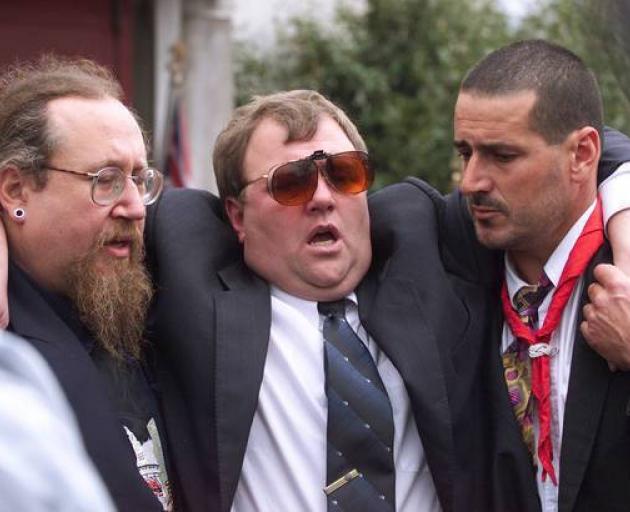 Mark Lundy being supported after the funeral of his wife Christine and daughter Amber in 2000....