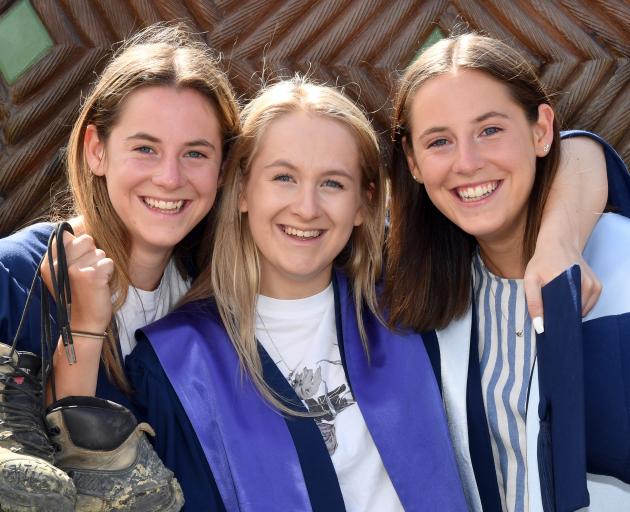 Identical twins Joccoaa (left, 20) (left) and Leonie, and sister Melina (21) Palmer, of Wingatui,...