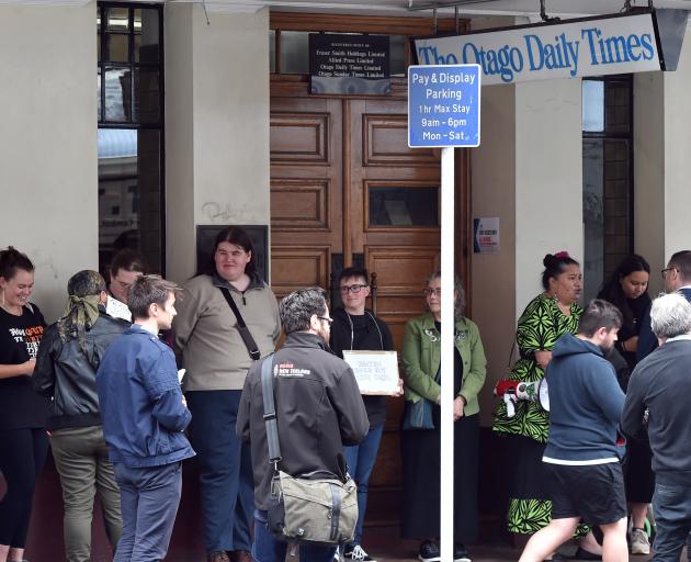 Protesters outside the Otago Daily Times this afternoon. Photo: Gregor Richardson