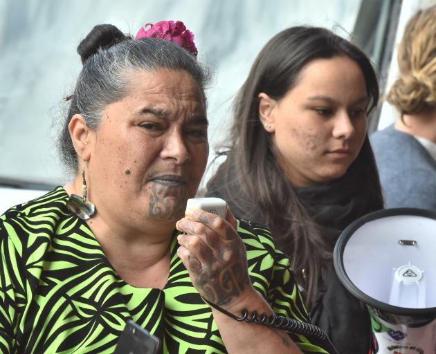 Sina Brown-Davis speaks to protesters outside the Otago Daily Times building. Photo: Gregor...