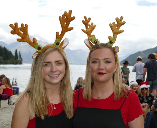 Irish tourists Caoimhe Regan, left, and Catie McLoughlin celebrating Christmas at Queenstown...