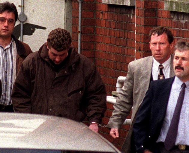 Gareth Smither (wearing brown) leaving court in 1997. Photo: ODT files