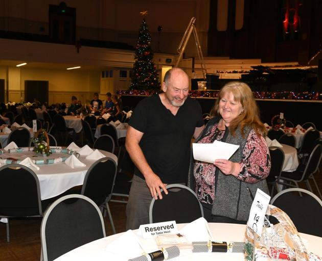 Organisers Grant and Anne Hardy put the finishing touches on the Dunedin Christmas Dinner. Photo: Linda Robertson
