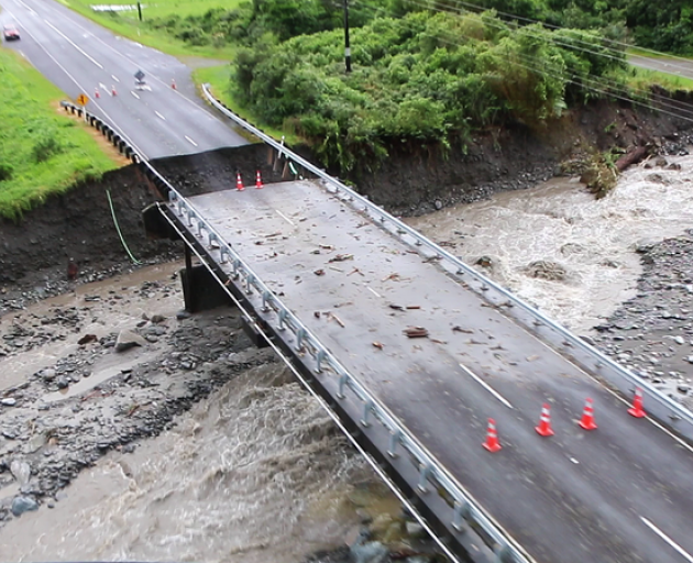 A washed out bridge near Mount Hercules on the West Coast during the weekend. Photo: RNZ / Conan Young