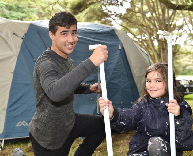 Setting up their campsite at Whare Flat yesterday were Corey Leathart-Sutherland (15) and Ruby...