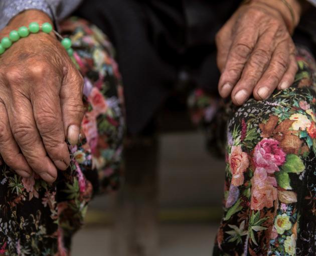 Hands may get wrinkled, but minds can stay sharp. Photo: Reuters