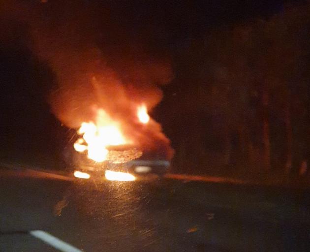A car "totally involved in fire" on Lower Styx Rd. Photo: Facebook