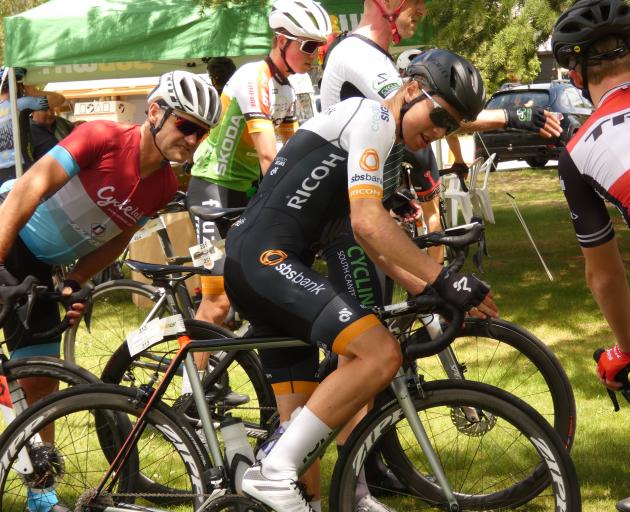 Kees Duyvesteyn hops off the bike at the finish of the Lake Dunstan Cycle Challenge in Cromwell...