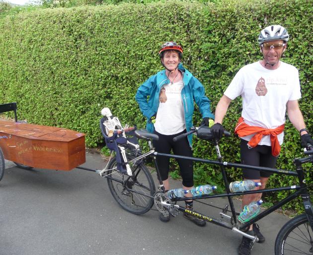 Camilla and Julian Cox left Ashburton on Wednesday morning with their tandem bike and coffin on...