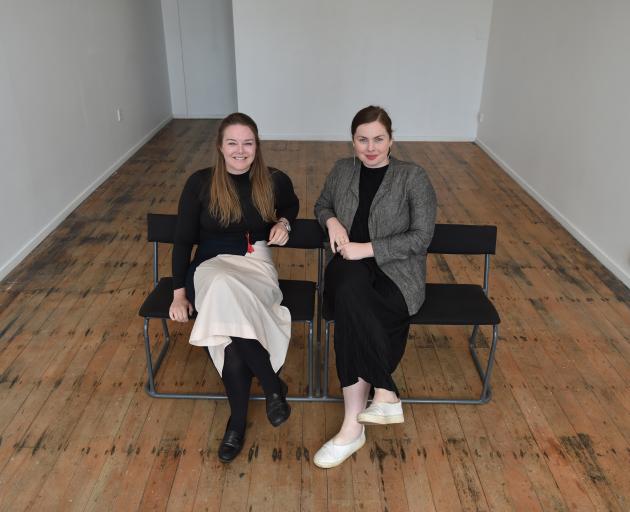 Grace Ryder (right) hands over the reins of the Blue Oyster Art Project Space to Hope Wilson earlier this month. Photos: Gregor Richardson