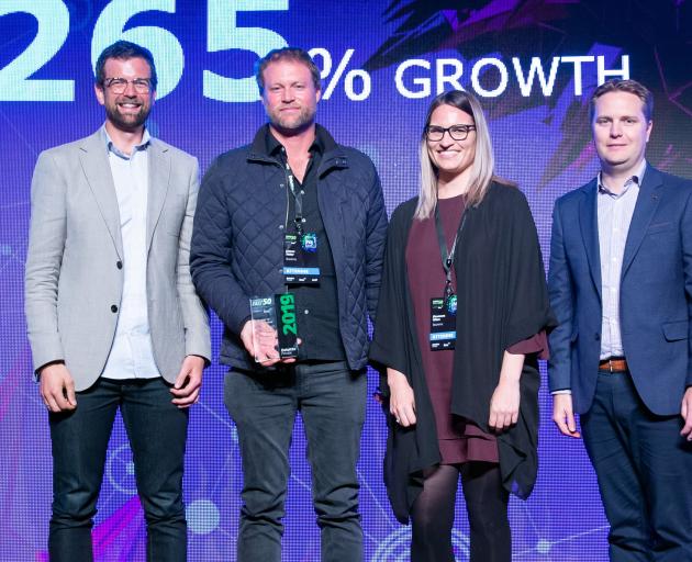 BNZ Head of Tech Tim Wixon (left) with Bookme founder and CEO James Alder, Shannon Winn and Deloitte partner Simon Chapman win Master of Growth index. Photo: Supplied