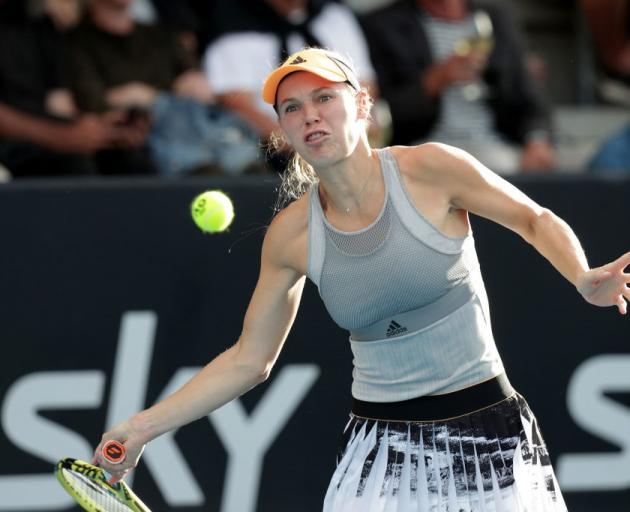 Caroline Wozniacki lines up a shot during her match at the ASB Classic yesterday. Photo: Getty...