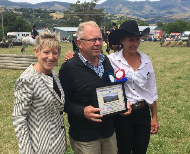 Christchurch Mayor Lianne Dalziel (left) and show president Tania Kiely (right) congratulate Paul de Latour on winning the Banks Peninsula Recognition Award. Photo: David Hill