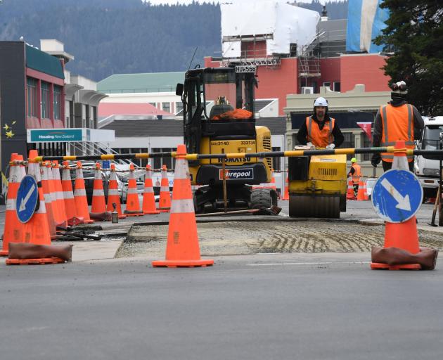 The sight of Downer contractors working on Dunedin’s Southern Motorway will soon be a thing of the past. Photo: Stephen Jaquiery