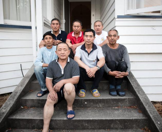 A group of Chinese workers who came to New Zealand after being promised work. Photo: RNZ/Claire...