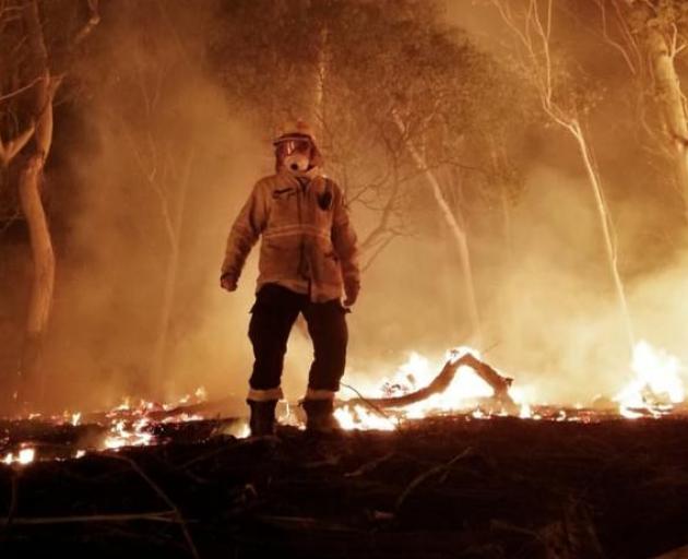 Fergus Simpson in the midst of a bushfire in Australia. Photo: Supplied/Fergus Simpson
