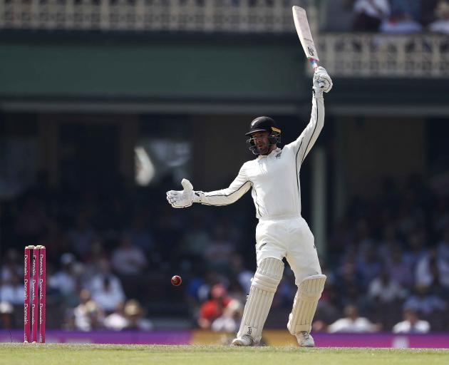 Black Cap Tom Blundell is struck by a delivery from Pat Cummins of Australia. Photo: Getty Images