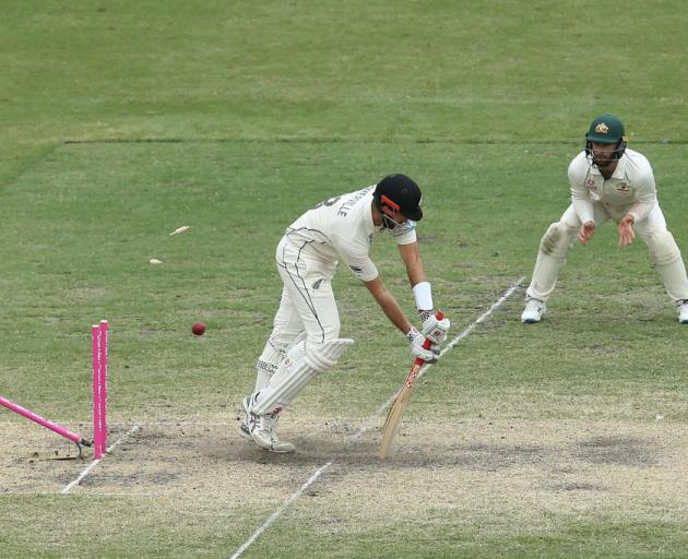 Will Somerville is bowled by Mitchell Starc on day four of the third Test in Sydney. Photo: Getty...